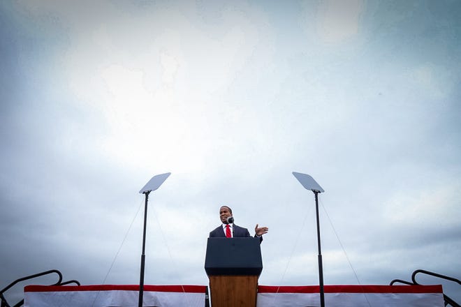 John James, US Senate candidate, gives a speech prior to the start of the rally. President Donald Trump makes a campaign stop at an airplane hangar in Freeland, Michigan on Thursday, September 10, 2020.
