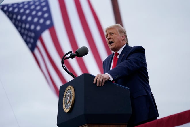 President Donald Trump speaks during a campaign rally last month in Freeland, Michigan.