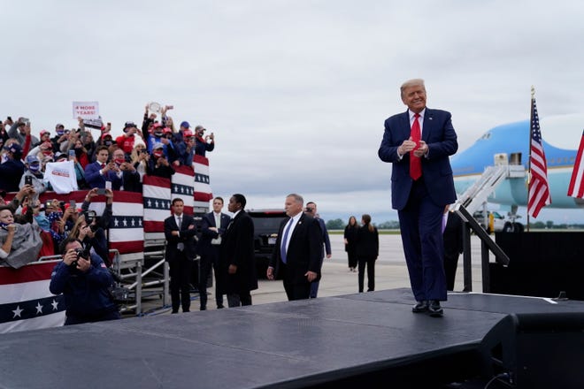 President Donald Trump arrives for a campaign rally at MBS International Airport, Thursday, Sept. 10, 2020, in Freeland, Mich.