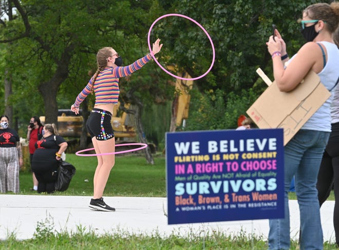 Taylor 'Steve' Alrutz  preforms with her hula hoops at the 2020 Detroit Slutwalk