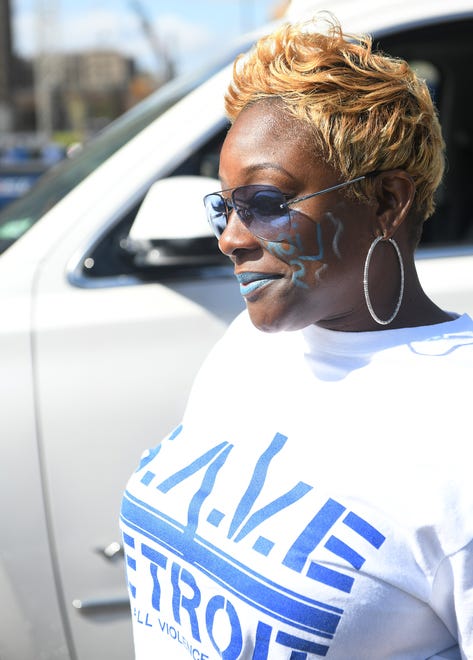 Nikki Haynes, 42, of Detroit painted her own face for pregame tailgating with her husband.  Detroit Lions vs Chicago Bears at Ford Field in Detroit on Sept. 13, 2020.
