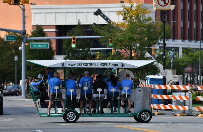 Lions fans pack a Detroit Rolling Pub vehicle before the game.  Detroit Lions vs Chicago Bears at Ford Field in Detroit on Sept. 13, 2020.