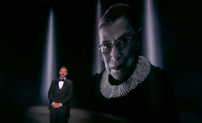 In this video grab captured on Sept. 20, 2020, courtesy of the Academy of Television Arts & Sciences and ABC Entertainment, Jimmy Kimmel presents an In Memoriam segment as an image of the late Supreme Court Justice Ruth Bader Ginsburg appears on screen during the 72nd Emmy Awards broadcast.
