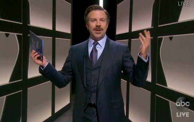 In this video grab captured on Sept. 20, 2020, courtesy of the Academy of Television Arts & Sciences and ABC Entertainment, Jason Sudeikis presents the award for outstanding comedy series during the 72nd Emmy Awards broadcast.