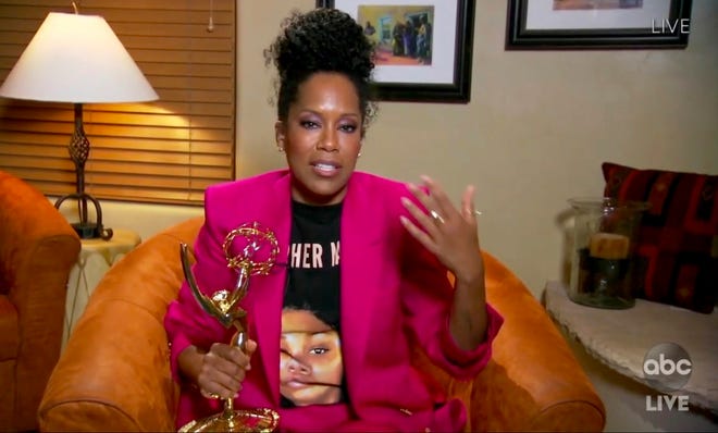 In this video grab captured on Sept. 20, 2020, courtesy of the Academy of Television Arts & Sciences and ABC Entertainment, Regina King accepts the award for outstanding lead actress in a limited series or movie for "Watchmen" during the 72nd Emmy Awards broadcast.