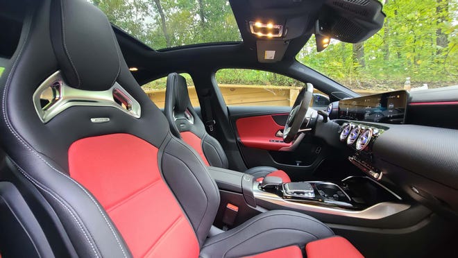 The interior of the 2020 Mercedes-AMG CLA 35 is optioned with sport seats and a sunroof.