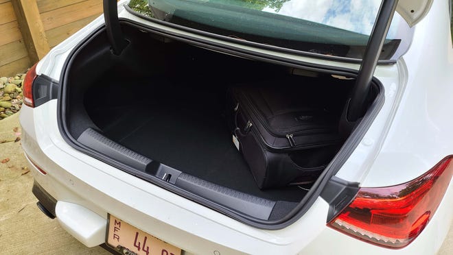 Not an SUV hatchback, but the 2020 Mercedes CLA has decent trunk space for multiple bags.