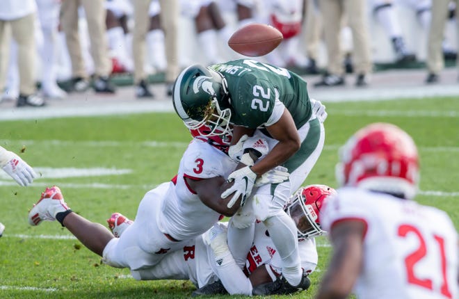 Michigan State running back Jordon Simmons fumbles and it is recovered by Rutgers early in the third quarter of last year's game.