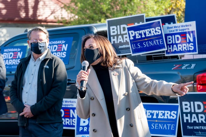 Democratic vice presidential candidate Sen. Kamala Harris (D-Calif) speaks to supporters at Sheet Metal Workers Local 80, in Southfield, while visiting Michigan on Election Day, November 3, 2020. At left is Sen. Gary Peters.