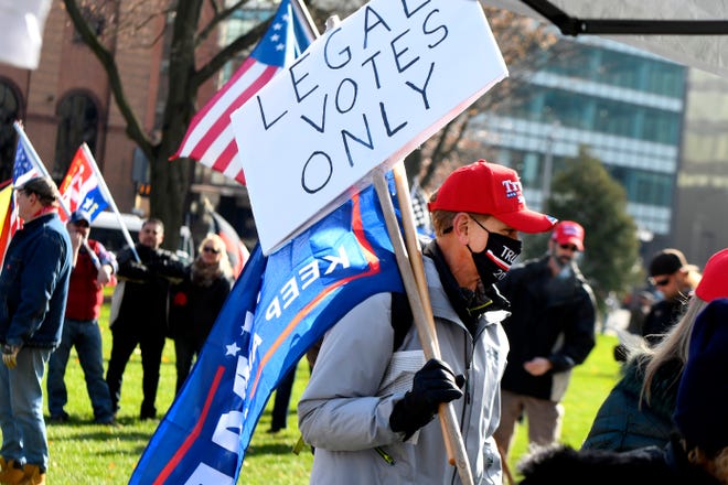 President Donald Trump supporters gather at the state Capitol Building  in Lansing for a "Stop the Steal" rally disputing the presidential voting Saturday, October 14, 2020.