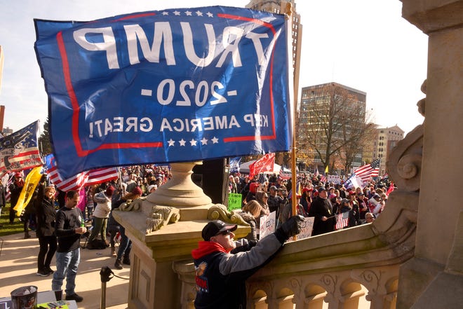 President Donald Trump supporters gather at the state Capitol Building  in Lansing for a "Stop the Steal" rally disputing the presidential voting tallies Saturday, October 14, 2020.