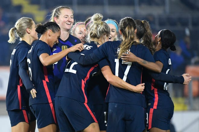 United States players celebrate with Kristie Mewis, number 22, who scored her side's second goal during the international friendly women's soccer match between The Netherlands and the US on Nov. 27 at the Rat Verlegh Stadium in Breda, southern Netherlands.