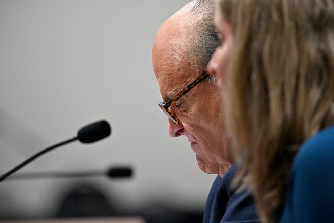 Rudy Giuliani testifies before the House Oversight Committee in Lansing.