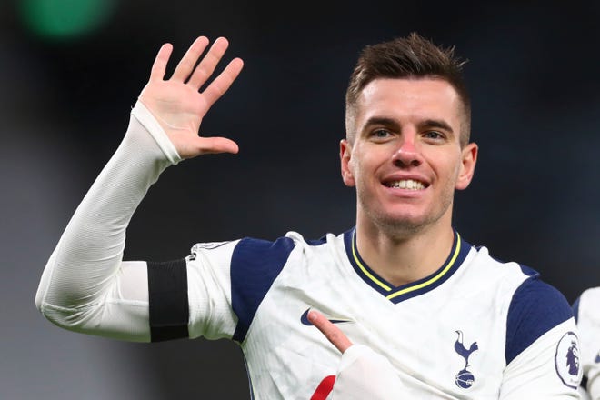 In this Nov. 21 photo, Tottenham's Giovani Lo Celso celebrates after scoring his side's second goal during their English Premier League soccer match against Manchester City at Tottenham Hotspur Stadium in London. Four Premier League players from Tottenham and West Ham have broken English lockdown laws by gathering inside a house together over Christmas just after the government had tightened coronavirus restrictions in response to a new transmissible variant.