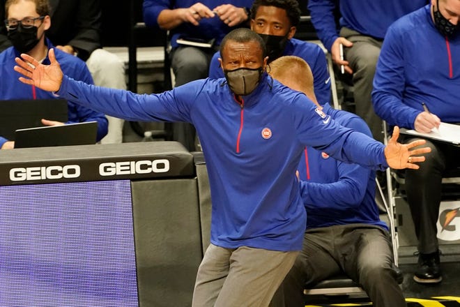Detroit Pistons head coach Dwane Casey gestures during the first half.