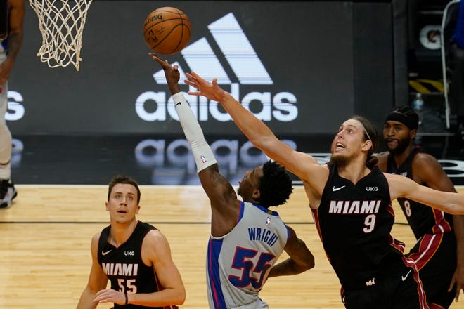 Detroit Pistons guard Delon Wright (55) drives to the basket at Miami Heat forward Kelly Olynyk (9) defends during the first half.