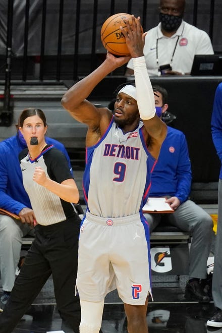 Detroit Pistons forward Jerami Grant (9) aims a three-point attempt during the first half.