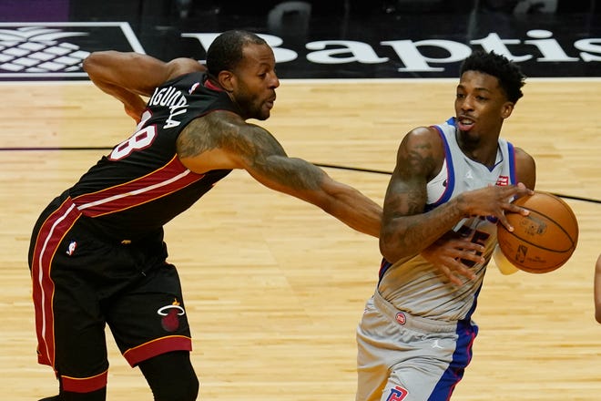 Detroit Pistons guard Delon Wright (55) attempts to drive to the basket as Miami Heat forward Andre Iguodala (28) defends during the first half.