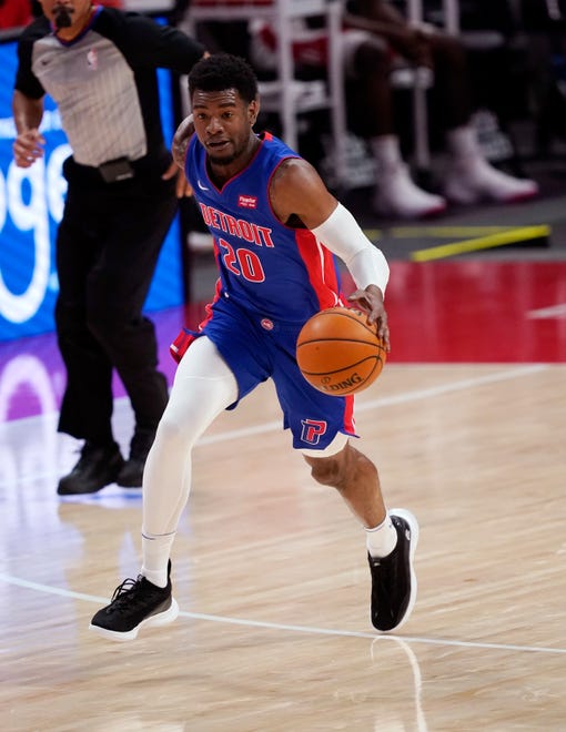 Detroit Pistons guard Josh Jackson brings the ball up court during the first half.