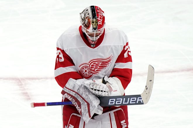 Detroit Red Wings goalie Thomas Greiss looks down as he skates on the ice during the second period.