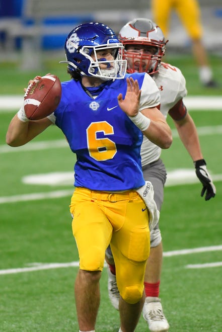 Grand Rapids Catholic Central quarterback Joey Silveri passes against Frankenmuth in the first half