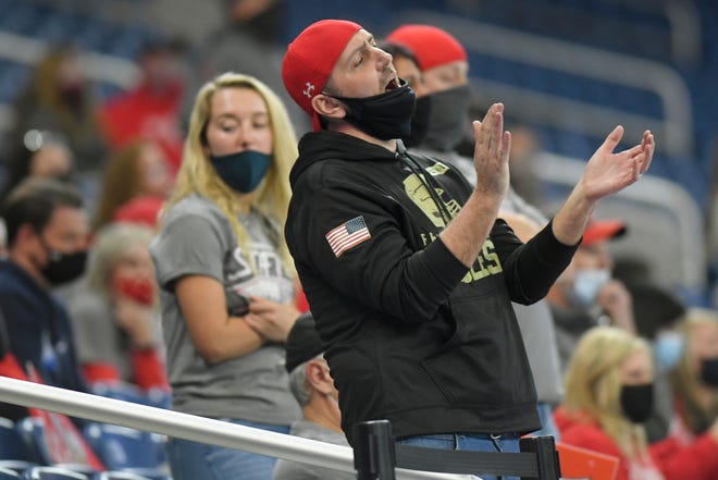 Frankenmuth fans cheer on their team as they played against Grand Rapids Catholic Central in the first half of a Division 5 football final.