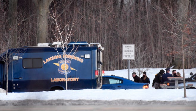 Michigan State Police and other investigators on the scene at a rest area just outside Grand Ledge on Thursday, Feb. 25, 2021. Former Olympics women's gymnastics coach John Geddert's body was discovered after he killed himself.