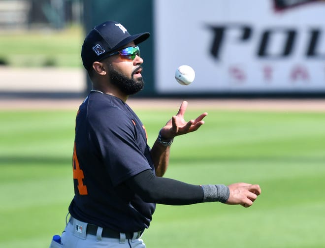 Tigers outfielder Derek Hill makes a barehanded catch during drills at the Detroit Tigers workout at Joker Marchant Stadium in Lakeland, Fla. on Feb. 27, 2021.