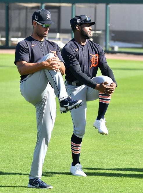 From left, Tigers prospect Riley Greene and outfielder Akil Baddoo warm up at the Detroit Tigers workout at Joker Marchant Stadium in Lakeland, Fla. on Feb. 27, 2021.