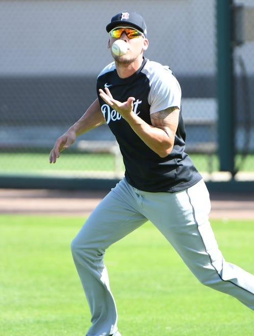 Tigers outfielder JaCoby Jones makes a barehanded catch during drills at the Detroit Tigers workout at Joker Marchant Stadium in Lakeland, Fla. on Feb. 27, 2021.