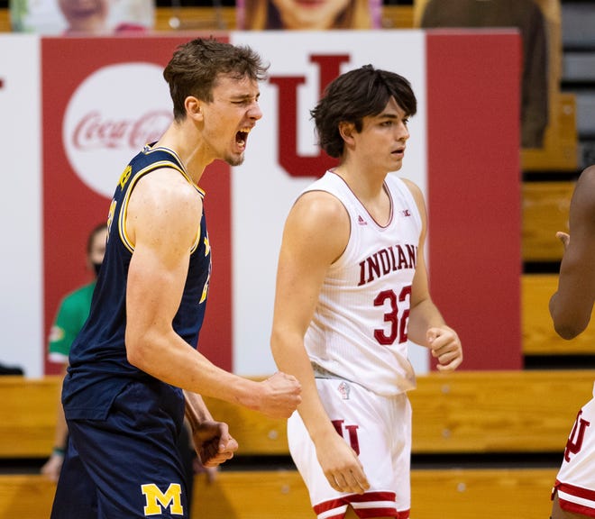 Michigan guard Franz Wagner (21) reacts after being fouled while scoring during the second half.