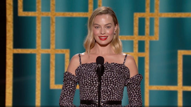 In this video grab issued Sunday, Feb. 28, 2021, by NBC, Margot Robbie speaks at the Golden Globe Awards.
