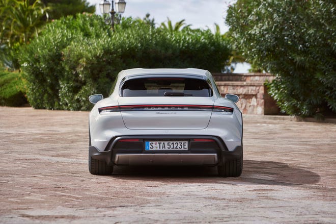 The 2021 Porsche Taycan Cross Turismo gets a hatchback for better cargo utility.