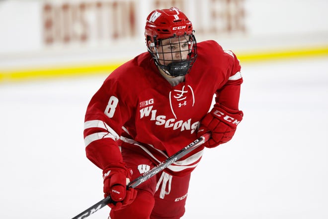 FILE - Wisconsin's Cole Caufield during an NCAA hockey game against Boston College on Friday, Oct. 11, 2019 in Chestnut Hill, Mass.