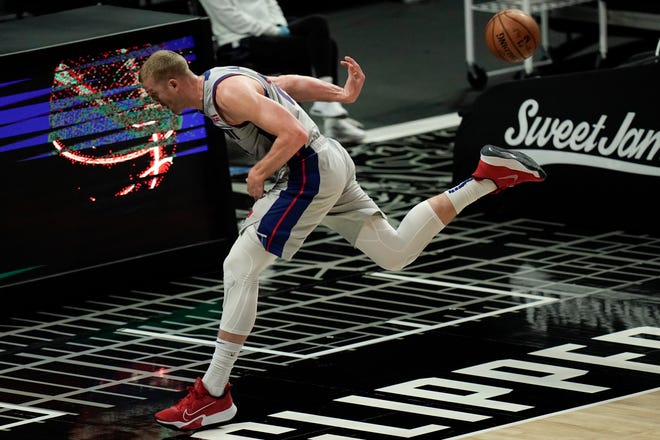 Detroit Pistons' Mason Plumlee retrieves a loose ball during the second half.