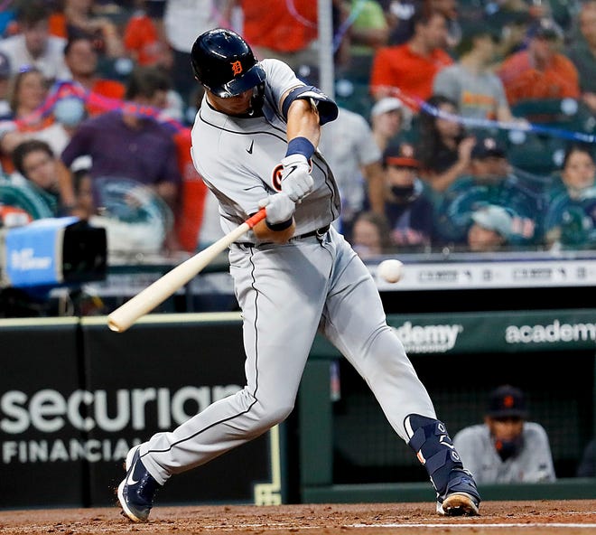 Grayson Greiner #17 of the Detroit Tigers hits two-run home run in the second inning against the Houston Astros at Minute Maid Park on April 12, 2021 in Houston, Texas.