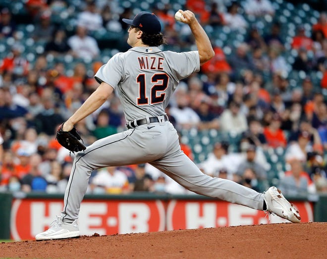 Casey Mize #12 of the Detroit Tigers pitches in the first inning against the Houston Astros at Minute Maid Park on April 12, 2021 in Houston, Texas.