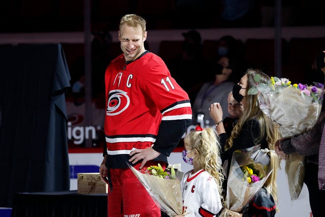 Carolina Hurricanes Jordan Staal (11) looks towards his family during a pre-game ceremony recognizing his 1000 career game prior to the first period of an NHL hockey game between the Carolina Hurricanes and the Detroit Red Wings in Raleigh, N.C., Monday, April 12, 2021.