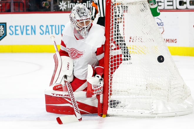 Detroit Red Wings goaltender Jonathan Bernier (45) eyes the puck against the Carolina Hurricanes during the second period.