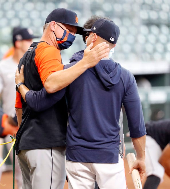 Manager A.J. Hinch #14 of the Detroit Tigers and bench coach Joe Espada #19 of the Houston Astros talk prior to their game at Minute Maid Park on April 12, 2021 in Houston, Texas.