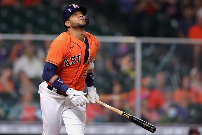 Yuli Gurriel #10 of the Houston Astros base hit during the second inning against the Detroit Tigers at Minute Maid Park on April 13, 2021 in Houston, Texas.