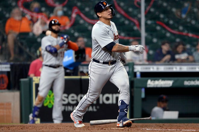 Detroit Tigers' Wilson Ramos watches his home run during the ninth inning of the team's baseball game against the Houston Astros on Tuesday, April 13, 2021, in Houston.