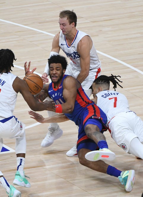 With 19 seconds left in a tied game and Pistons with the ball on the sideline, Clippers' Luke Kennard, Amir Coffey and Terance Mann go after Pistons' Saddiq Bey on the inbounds pass, forcing Bey to throw it away to Clippers' Terance Mann for the turnover late in the fourth quarter.