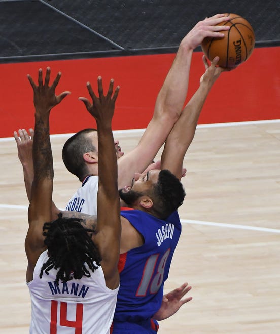 Clippers' Ivica Zubac blocks a shot by Pistons' Cory Joseph in the third quarter.