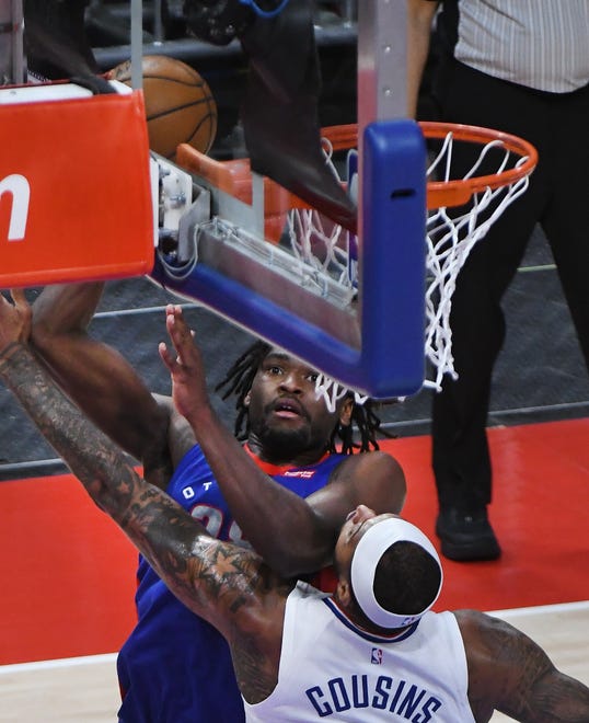 Pistons' Isaiah Stewart goes to the rim over Clippers' DeMarcus Cousins in the fourth quarter.