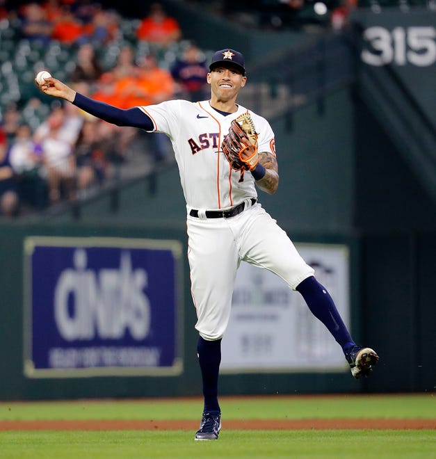 Carlos Correa #1 of the Houston Astros throws out Renato Nunez #55 of the Detroit Tigers in the fourth inning at Minute Maid Park on April 14, 2021 in Houston, Texas.