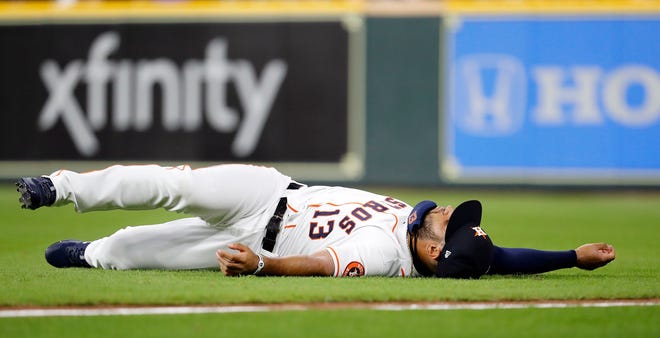 Abraham Toro #13 of the Houston Astros stretches before a game against the Detroit Tigers at Minute Maid Park on April 14, 2021 in Houston, Texas.