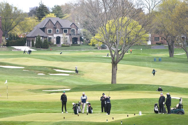 High-school golfers participate in a jamboree on the north course of Oakland Hills Country Club.