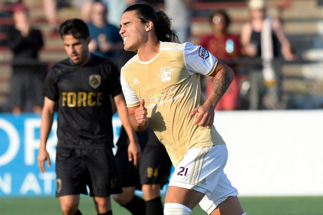 Detroit City FC midfielder Maxi Rodriguez winces after missing wide on a shot attempt against the L.A. Force in the first half.
