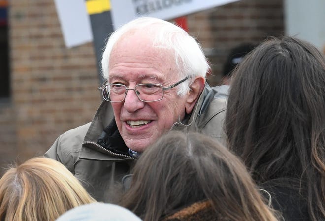 U.S. Senator Bernie Sanders shakes hands with attendees after speaking at a rally for striking Kellogg's workers at Farmers Market Square in Battle Creek, Michigan on December 17, 2021.